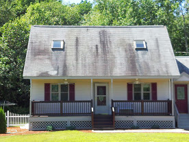 before pressure washing a roof